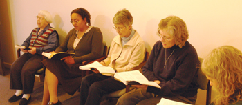 SISTER NICOLE and other Marianist Sisters at community prayer.